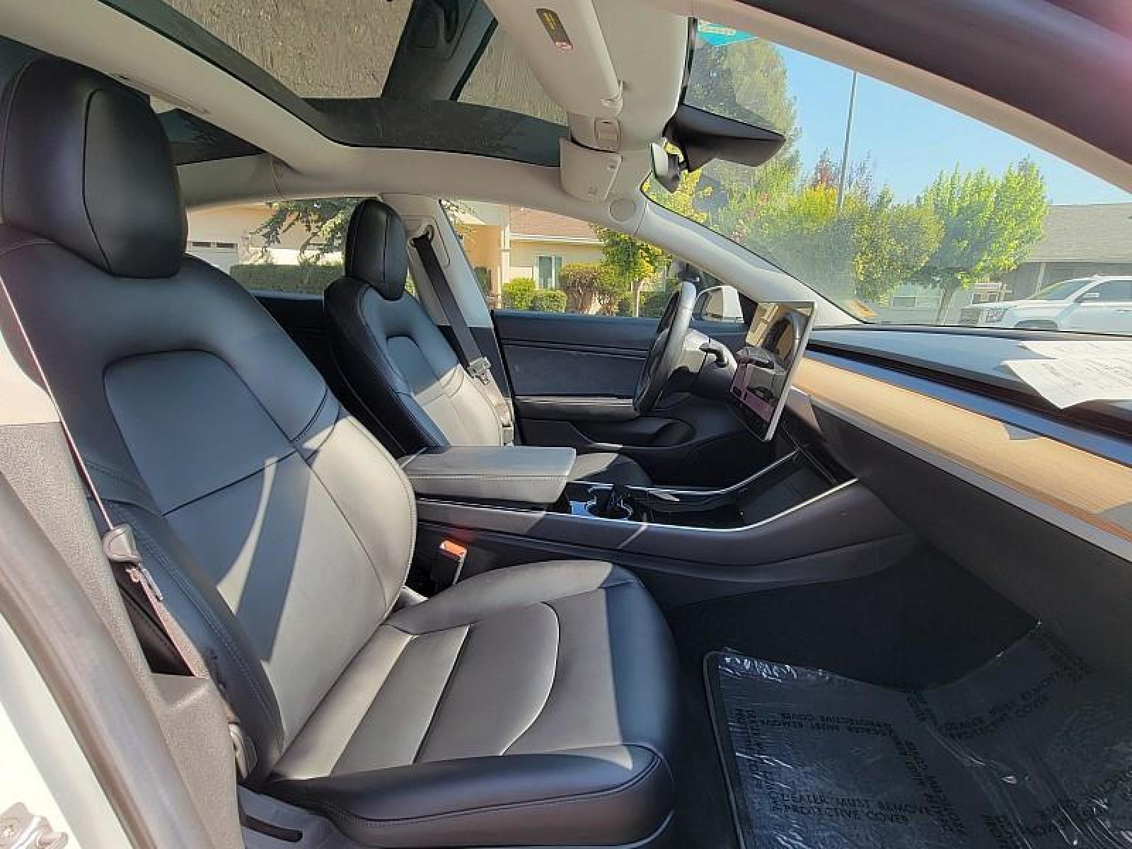 2018 WHITE /BLACK Tesla Model 3 (5YJ3E1EA9JF) with an AC Electric Motor engine, Single-Speed Fixed Gear transmission, located at 246 E Walker St., Orland, 95963, (530) 865-5800, 39.747589, -122.178398 - Photo #16