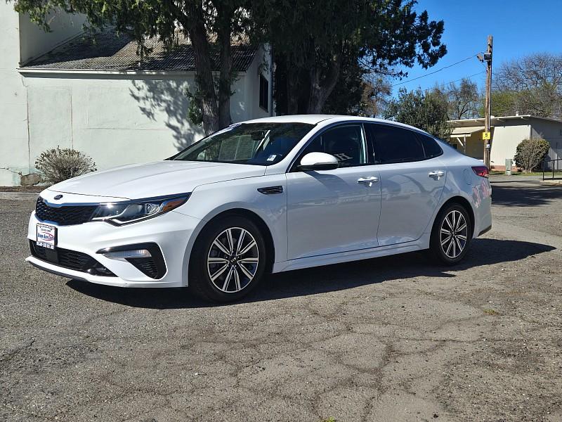 2019 WHITE Kia Optima (5XXGU4L17KG) with an 4-Cyl Turbo 1.6 Liter engine, Automatic 7-Spd Dual-Clutch w/H-Matic transmission, located at 246 E Walker St., Orland, 95963, (530) 865-5800, 39.747589, -122.178398 - Photo #2