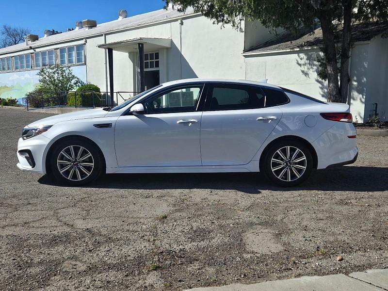 2019 WHITE Kia Optima (5XXGU4L17KG) with an 4-Cyl Turbo 1.6 Liter engine, Automatic 7-Spd Dual-Clutch w/H-Matic transmission, located at 246 E Walker St., Orland, 95963, (530) 865-5800, 39.747589, -122.178398 - Photo #3