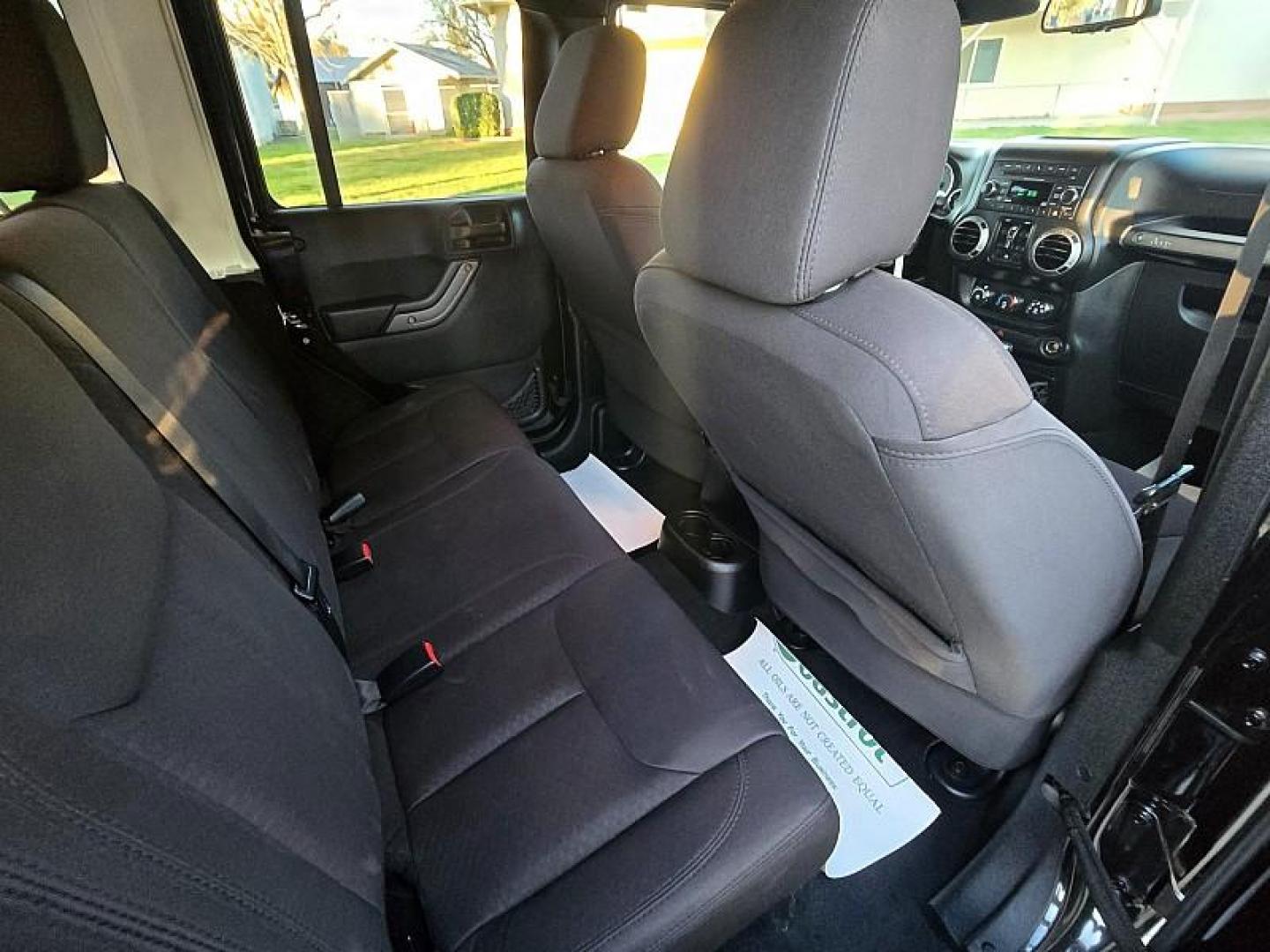2013 BLACK Jeep Wrangler Unlimited (1C4BJWDG4DL) with an V6 3.6 Liter engine, Automatic 5-Spd transmission, located at 246 E Walker St., Orland, 95963, (530) 865-5800, 39.747589, -122.178398 - Photo#14