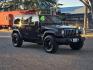 2013 BLACK Jeep Wrangler Unlimited (1C4BJWDG4DL) with an V6 3.6 Liter engine, Automatic 5-Spd transmission, located at 246 E Walker St., Orland, 95963, (530) 865-5800, 39.747589, -122.178398 - Photo#0